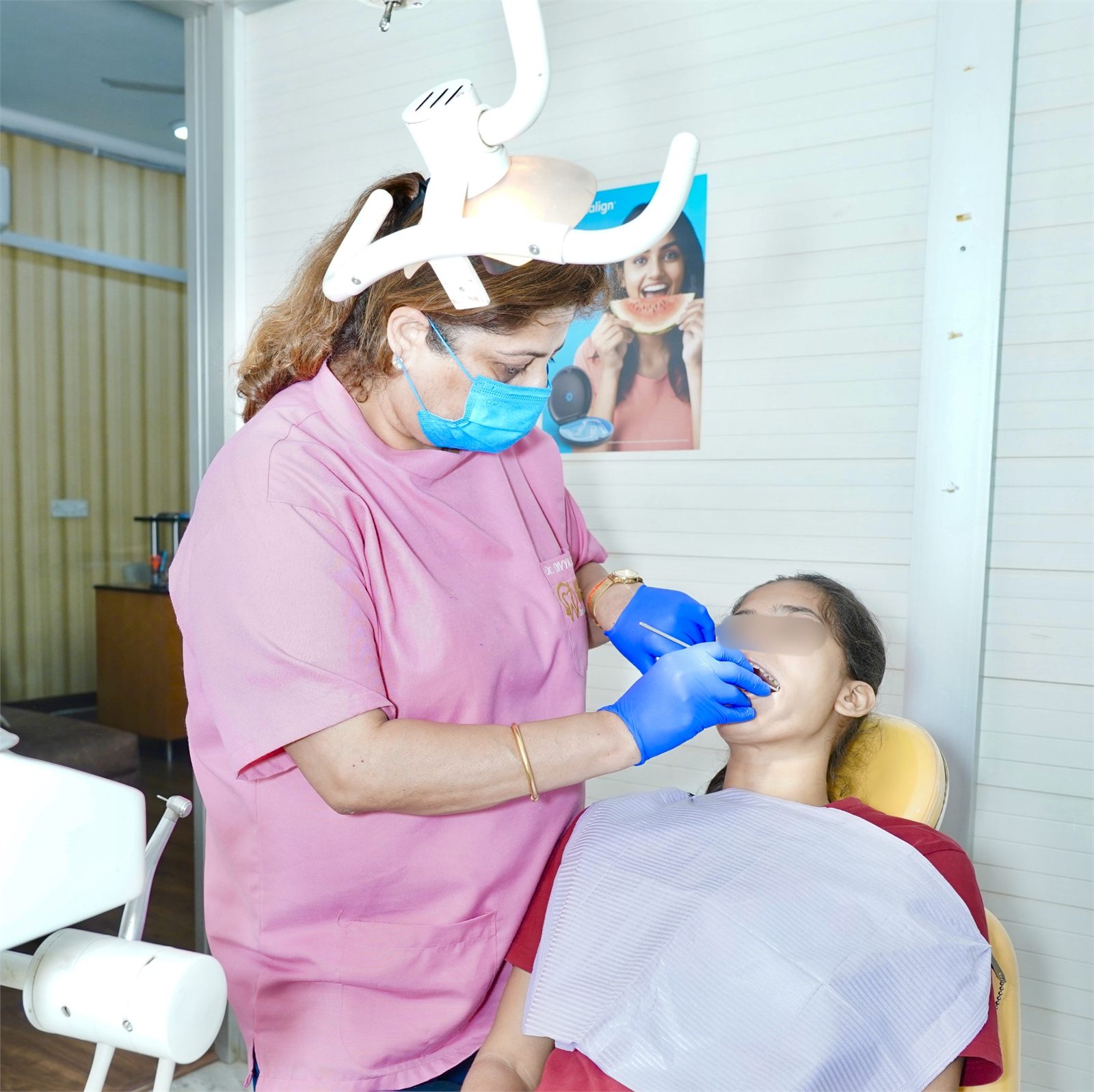 Dentist treating a child patient at Marwaha Dental Clinic in Gurugram