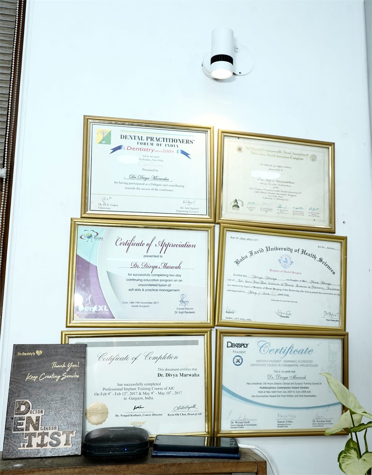 Clinical certificates displayed at Marwaha Dental Clinic in Gurugram