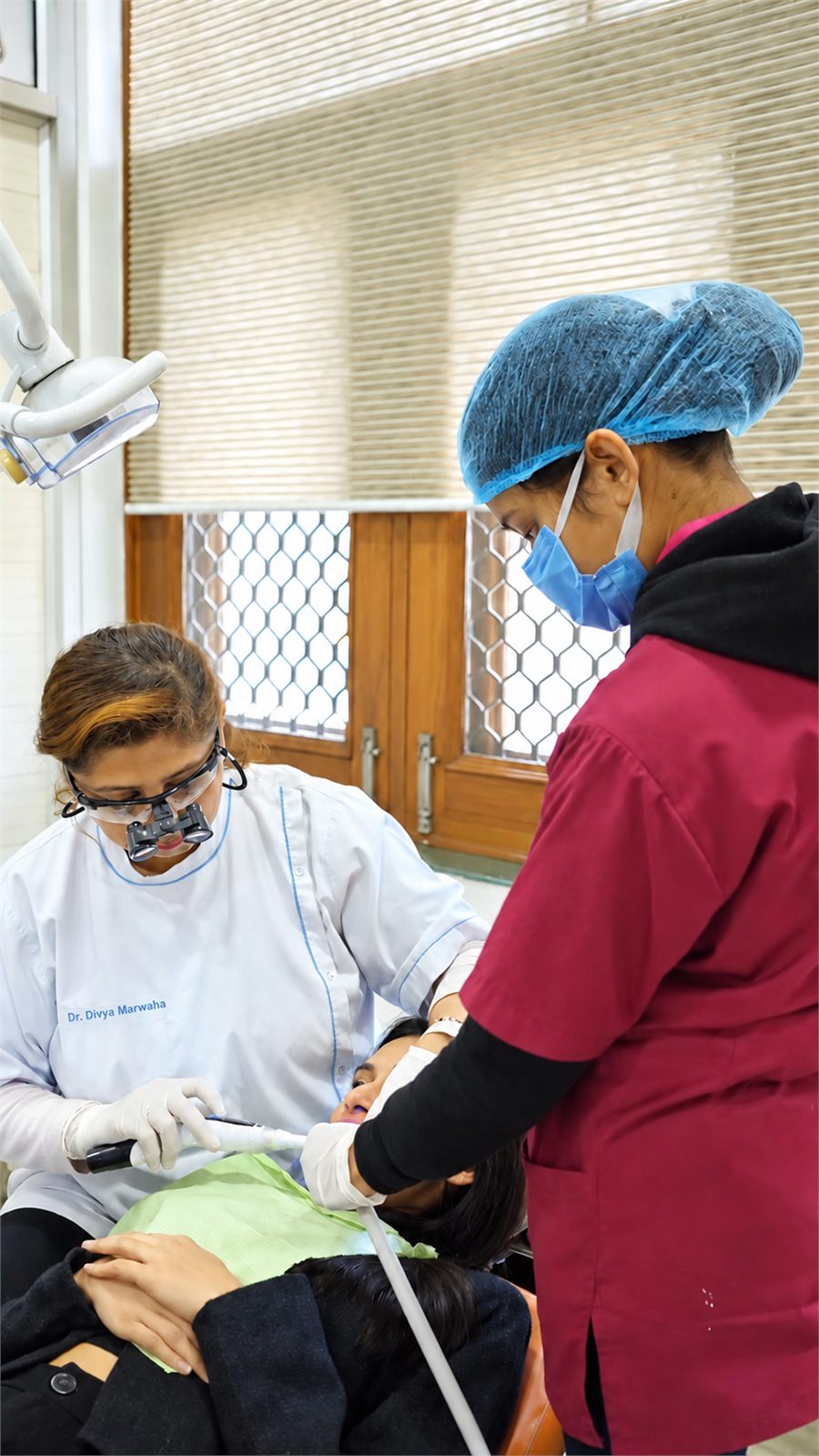 Dentist treating a patient at Marwaha Dental Clinic in Gurugram